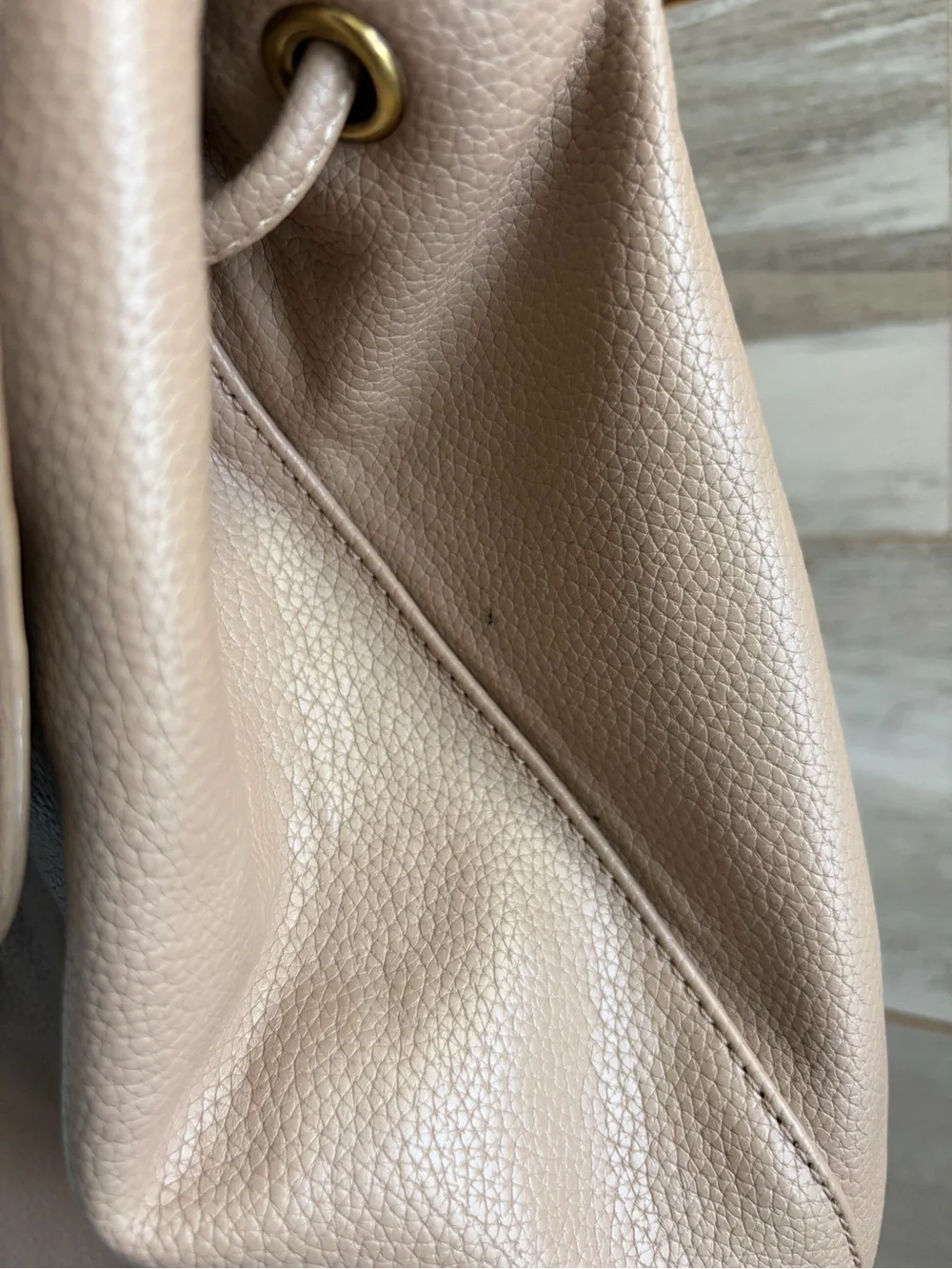 Source Unknown leather or refunds